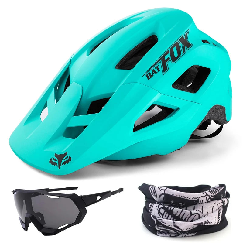 Turquoise helmet with 'Bat-Fox' branding, sunglasses, and neck gaiter on a white background