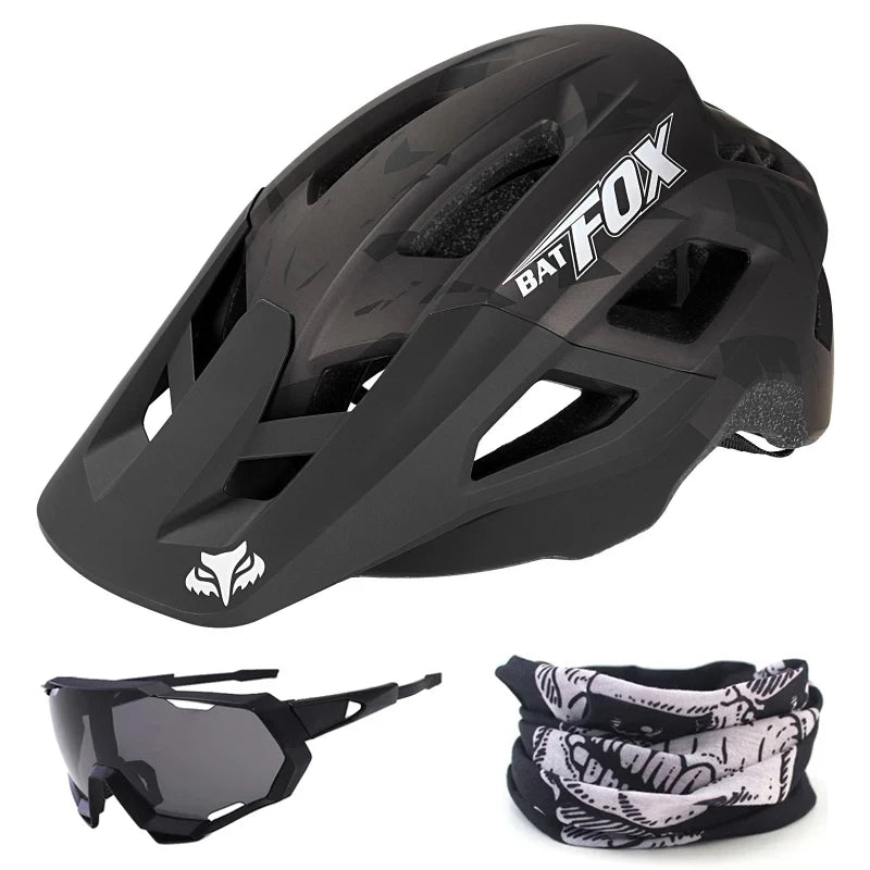 Black helmet with 'Bat-Fox' branding, black sunglasses, and black and white patterned neck gaiter on a white background
