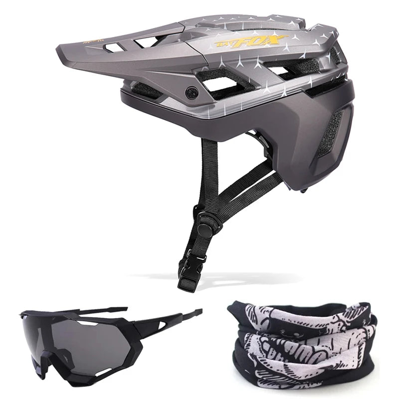 Helmet, sunglasses, and neck gaiter set on a white background