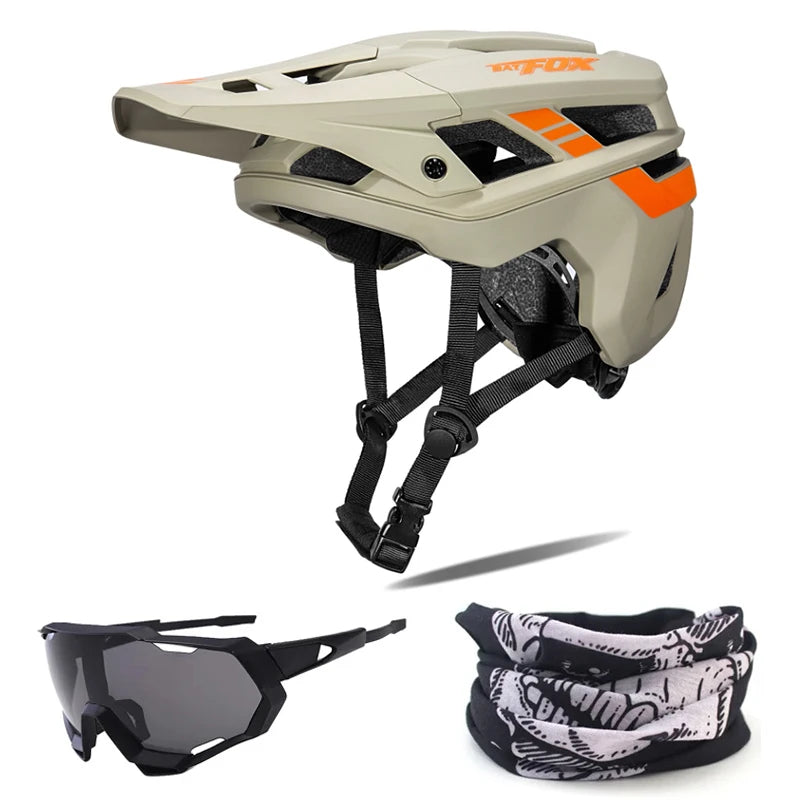 Beige helmet with black and orange accents, sunglasses, and a black and white patterned neck gaiter on a white background.